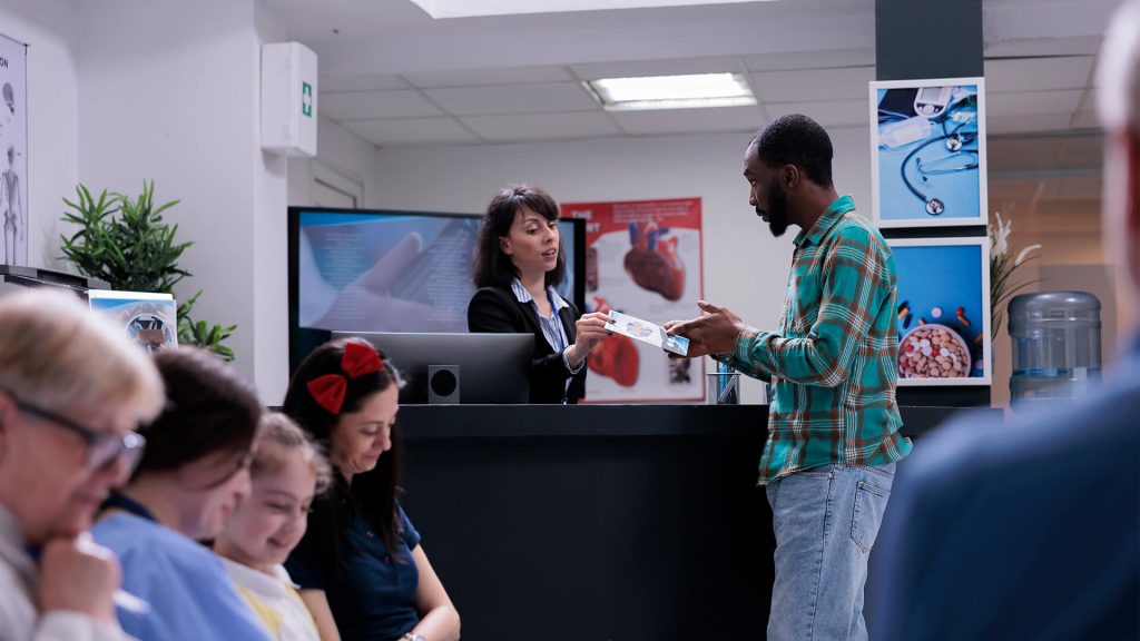 Patients waiting in a clean GP surgery or hospital reception area